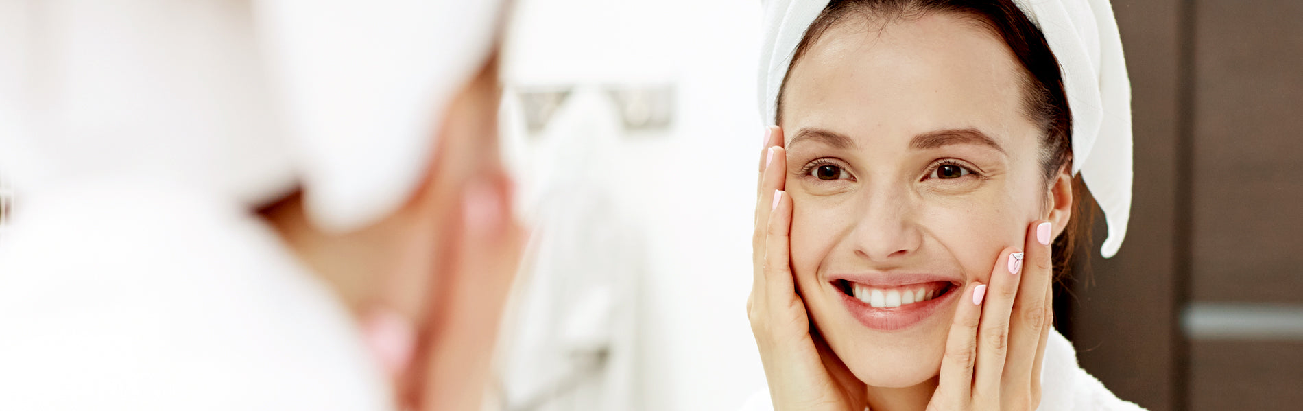 Woman using the Project E Beauty toner, eye essence, moisturizer, and face wash